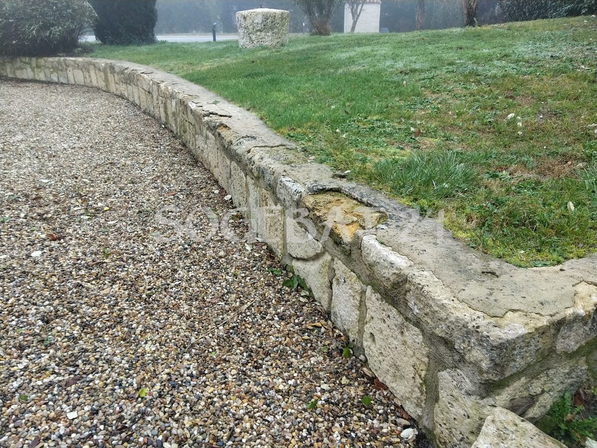 Restauration d'un muret de soutènement en pierre de taille – 9